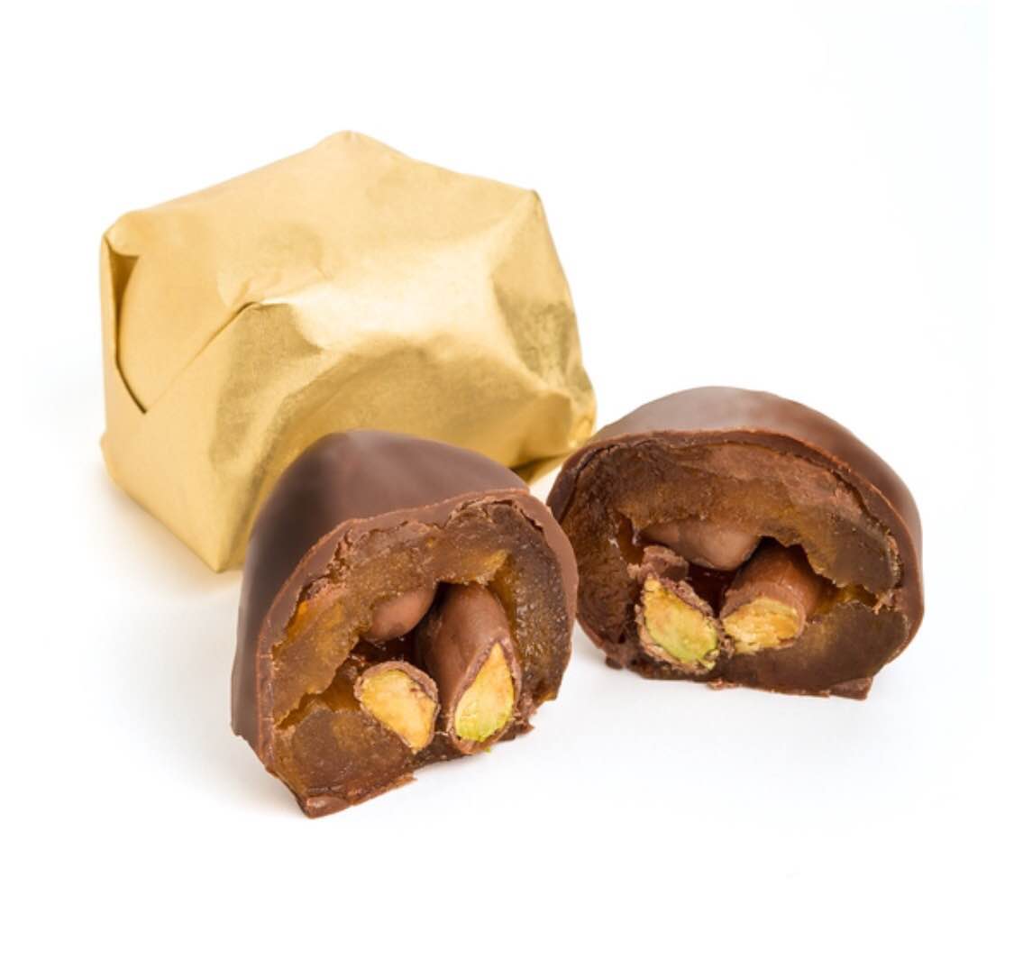 CHOCOLATE COVERED APRICOT FILLED WITH PISTACHIOS